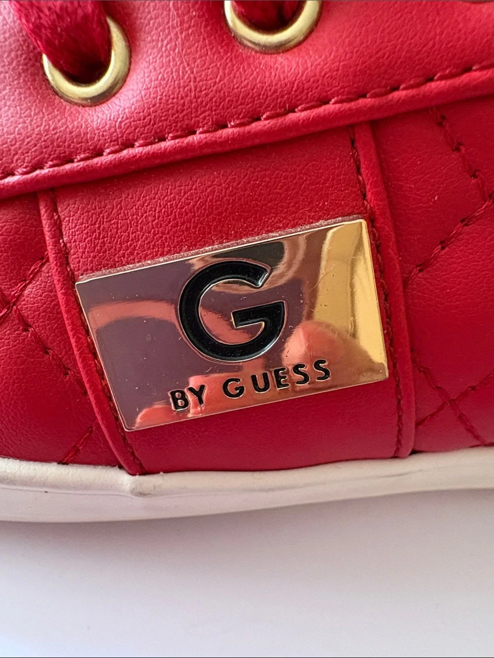 GUESS size 7.5 red quilted leather Sneakers with Gold Hardware very good shape